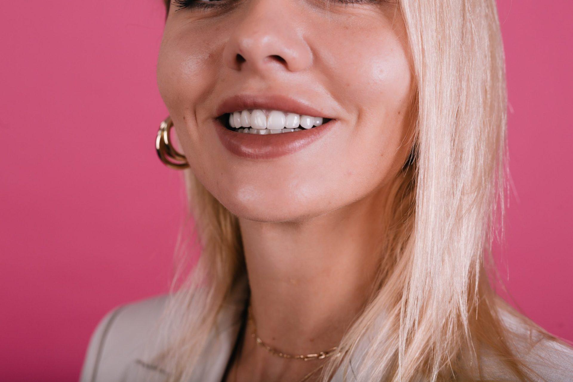 close portrait of women s perfect smile with whitesnow smile veneers and big beautiful lips close portrait of women s perfect smile with whitesnow smile veneers and big beautiful lips